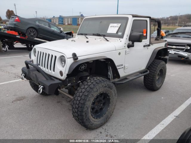 1C4AJWAG9GL297973 Jeep Wrangler Sport