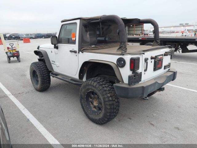 1C4AJWAG9GL297973 Jeep Wrangler Sport