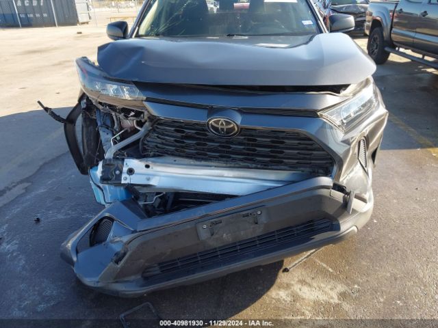 JTMH1RFV8KD006857 Toyota RAV4 LE