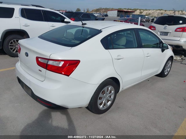 KNADM4A30F6444083 KIA RIO LX