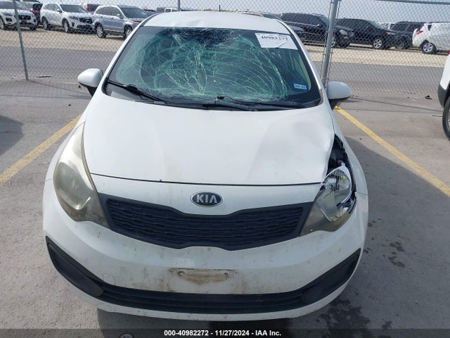 KNADM4A30F6444083 KIA RIO LX