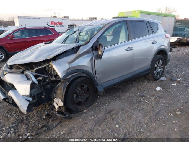2T3ZFREV2JW461681 Toyota RAV4 LE