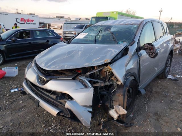 2T3ZFREV2JW461681 Toyota RAV4 LE