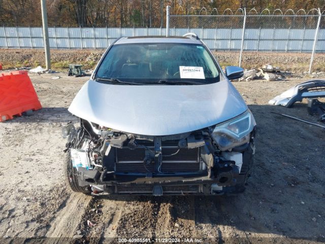 JTMRJREV1GD015459 Toyota Rav4 Hybrid Xle