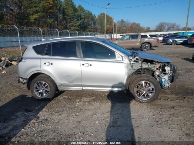 JTMRJREV1GD015459 Toyota Rav4 Hybrid Xle