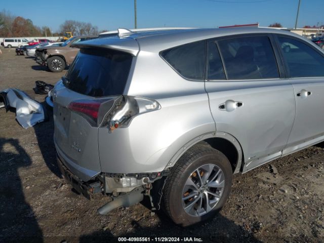 JTMRJREV1GD015459 Toyota Rav4 Hybrid Xle