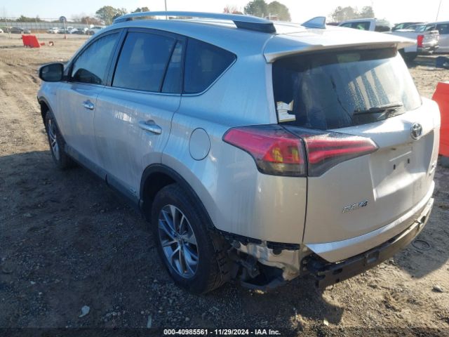 JTMRJREV1GD015459 Toyota Rav4 Hybrid Xle
