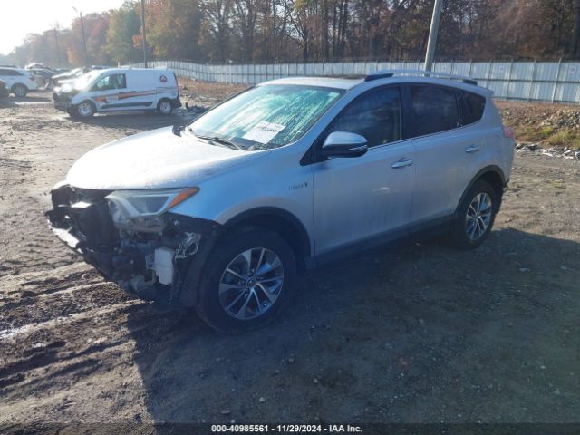 JTMRJREV1GD015459 Toyota Rav4 Hybrid Xle
