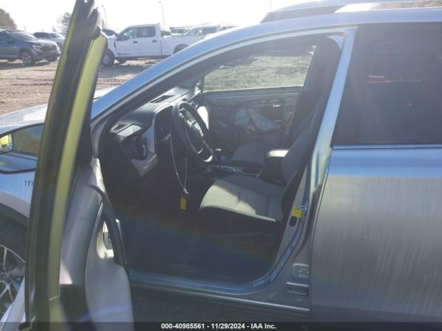 JTMRJREV1GD015459 Toyota Rav4 Hybrid Xle