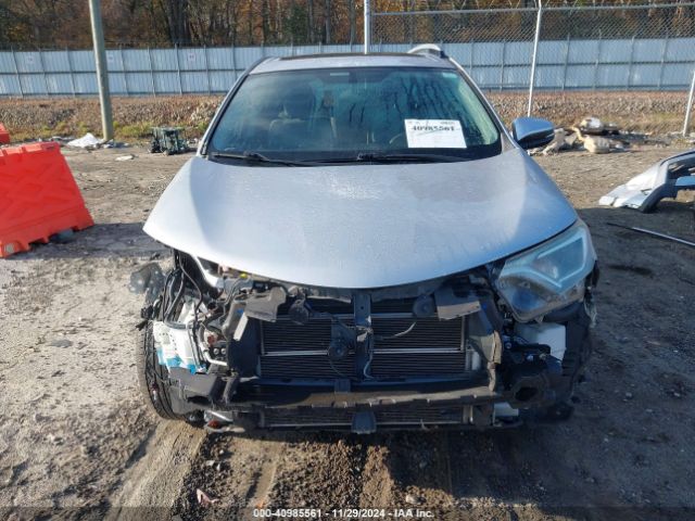 JTMRJREV1GD015459 Toyota Rav4 Hybrid Xle