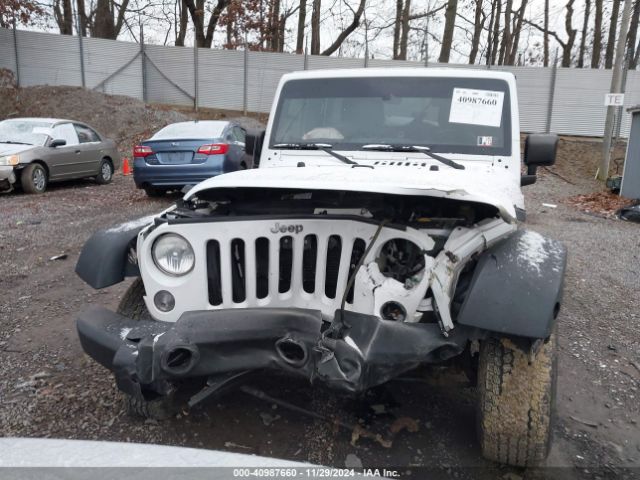 1C4BJWDG0EL208191 Jeep Wrangler Unlimited Sport