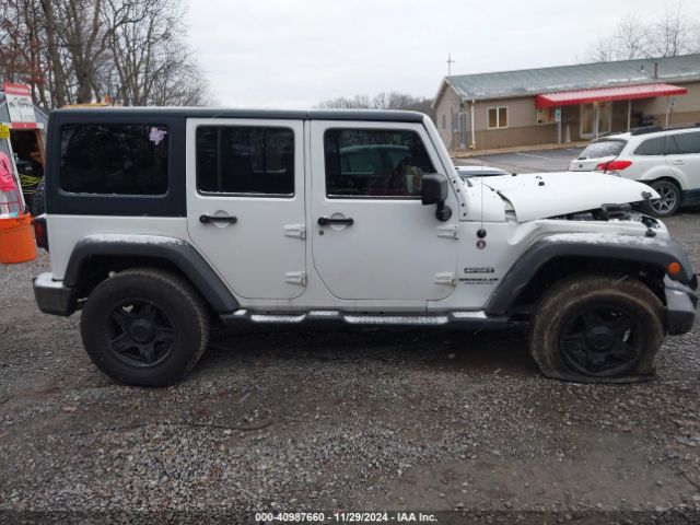 1C4BJWDG0EL208191 Jeep Wrangler Unlimited Sport