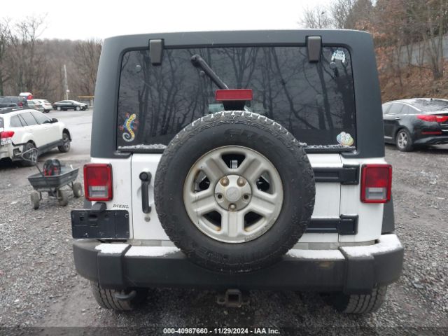 1C4BJWDG0EL208191 Jeep Wrangler Unlimited Sport