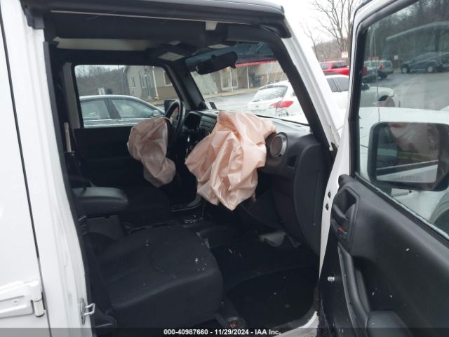 1C4BJWDG0EL208191 Jeep Wrangler Unlimited Sport