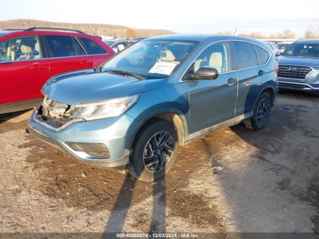 2HKRM3H44GH549038 Honda CR-V SE
