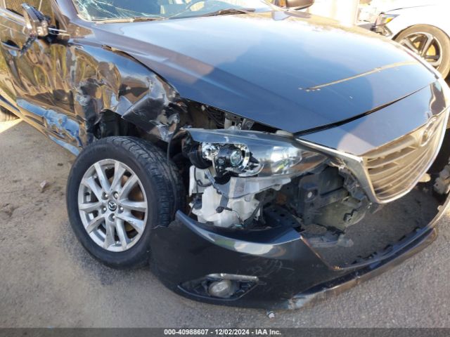 3MZBM1W74GM251230 Mazda Mazda3 I Touring