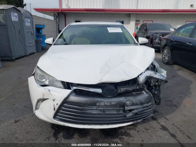 4T1BD1FK6GU185049 Toyota Camry Hybrid Le