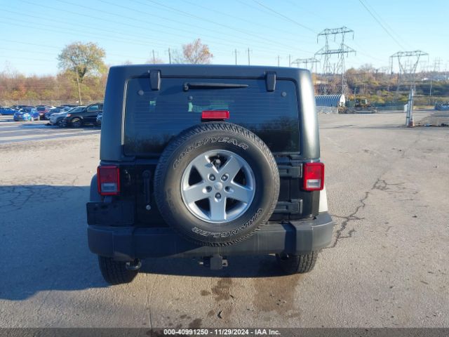 1C4AJWAG7FL611909 Jeep Wrangler Sport