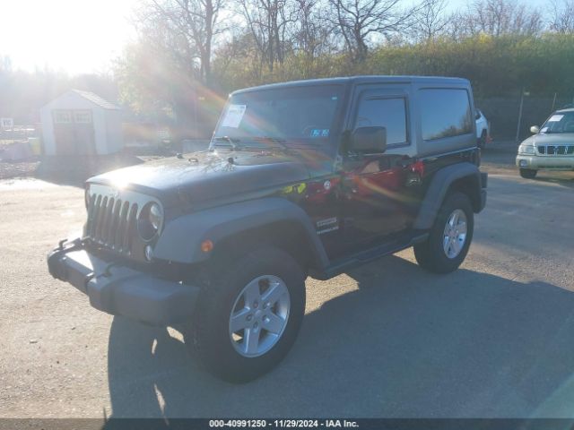 1C4AJWAG7FL611909 Jeep Wrangler Sport