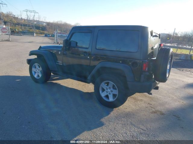 1C4AJWAG7FL611909 Jeep Wrangler Sport