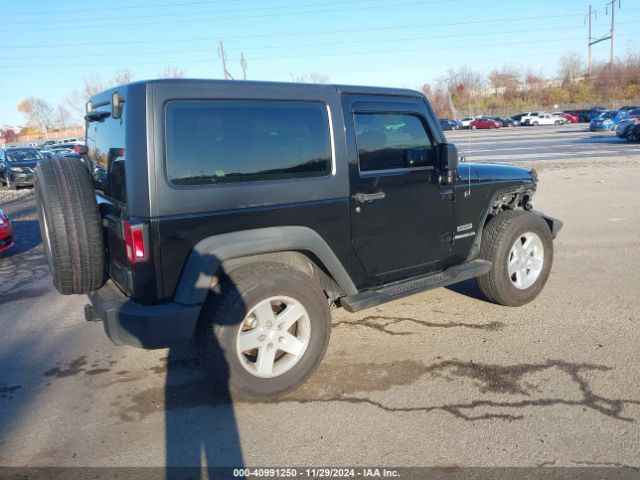 1C4AJWAG7FL611909 Jeep Wrangler Sport