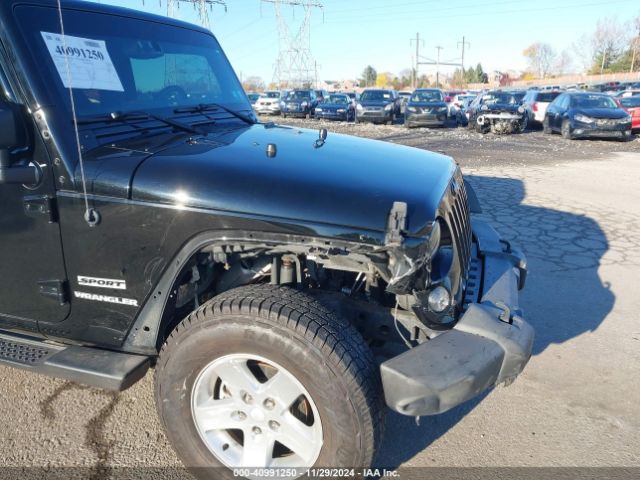 1C4AJWAG7FL611909 Jeep Wrangler Sport