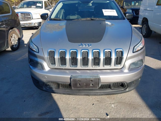 1C4PJMAB9EW233043 Jeep Cherokee Sport
