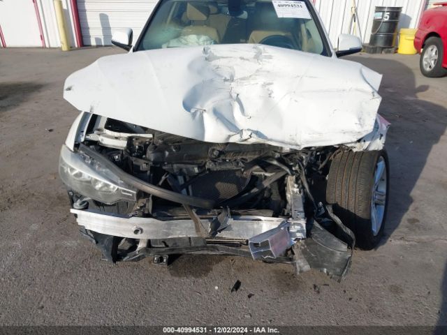 WBA3A5C59FF607659 BMW 328I