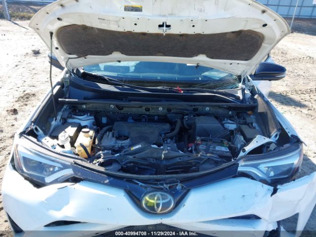 JTMNFREV3JD121452 Toyota RAV4 SE