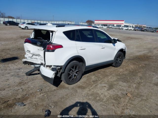 JTMNFREV3JD121452 Toyota RAV4 SE