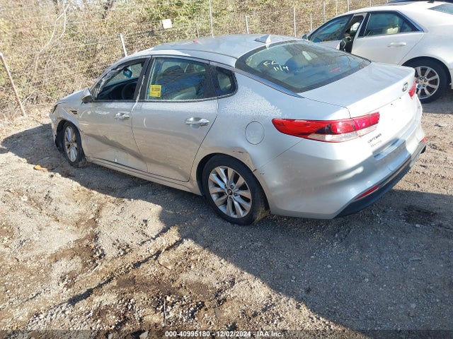 5XXGT4L35GG059931 KIA Optima Lx