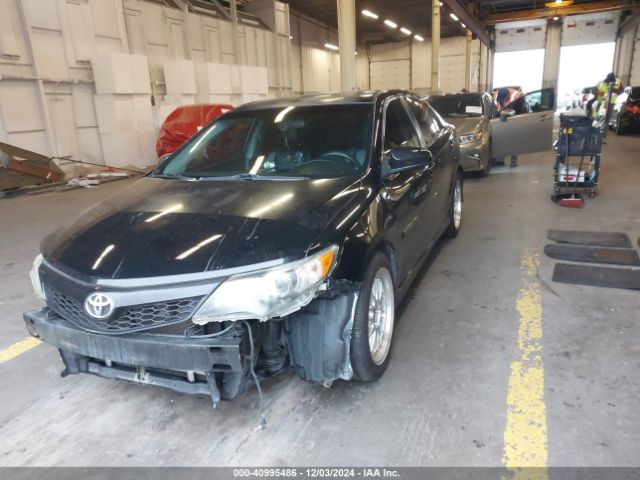 4T1BF1FK6EU300451 Toyota CAMRY SE