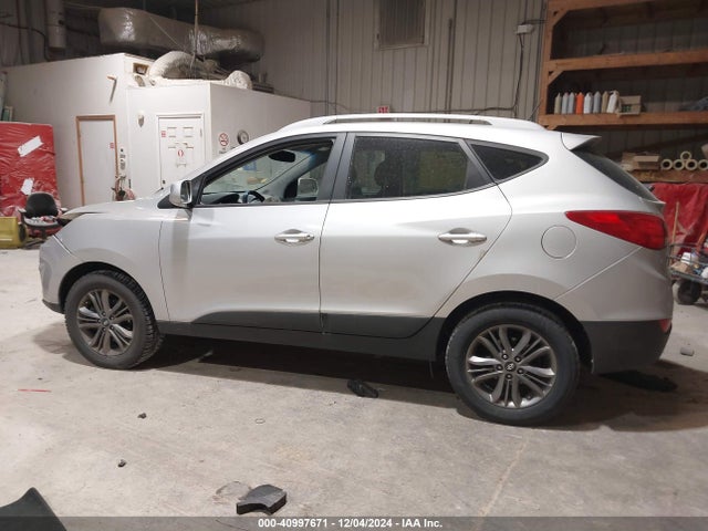 KM8JUCAG2EU800042 Hyundai TUCSON SE