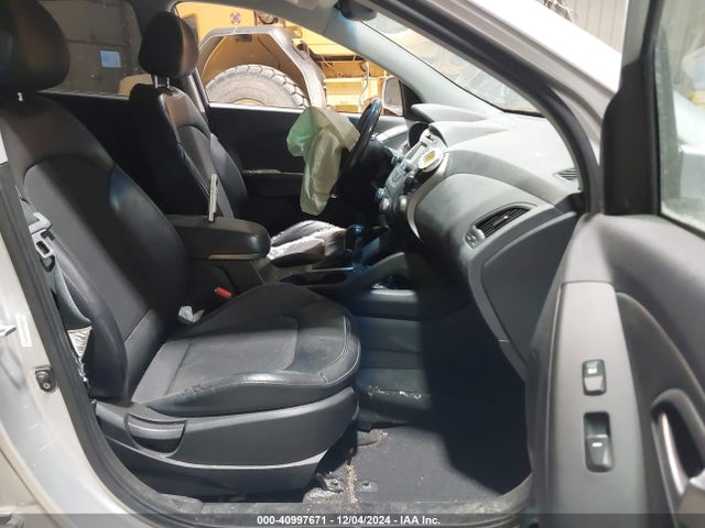 KM8JUCAG2EU800042 Hyundai TUCSON SE