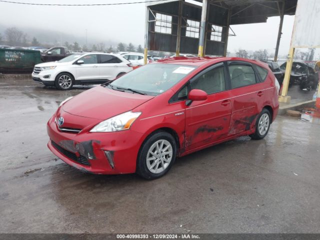 JTDZN3EU6EJ010670 Toyota Prius V Three