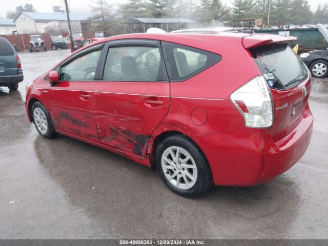 JTDZN3EU6EJ010670 Toyota Prius V Three