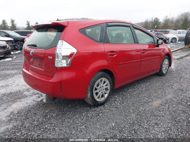 JTDZN3EU6EJ010670 Toyota Prius V Three