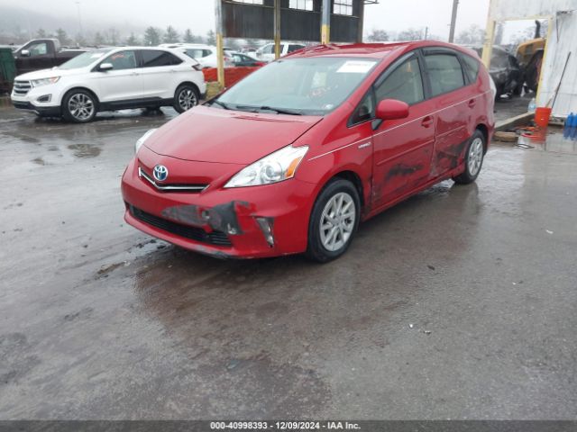 JTDZN3EU6EJ010670 Toyota Prius V Three