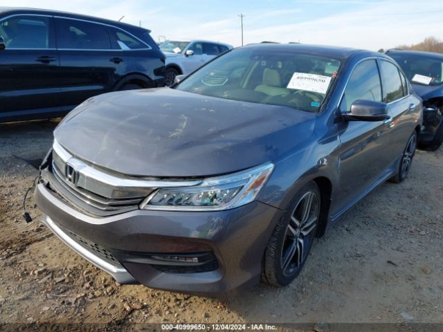1HGCR3F92GA033002 Honda Accord Touring