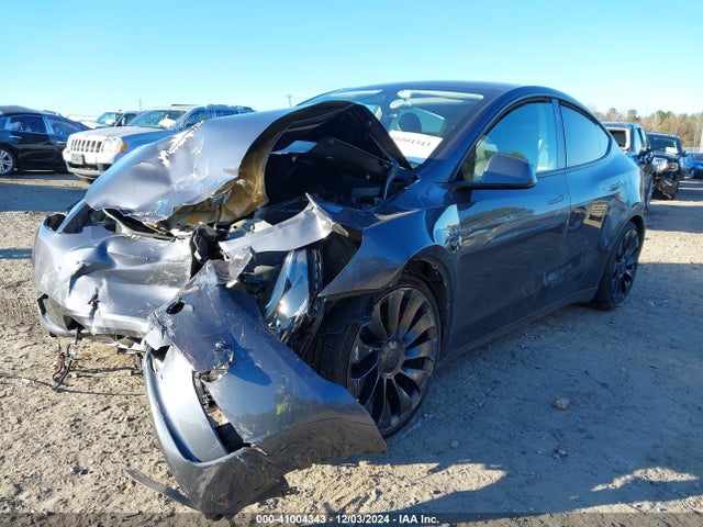 2023 TESLA MODEL Y 7SAYGDEF6PF865153 Photo 1
