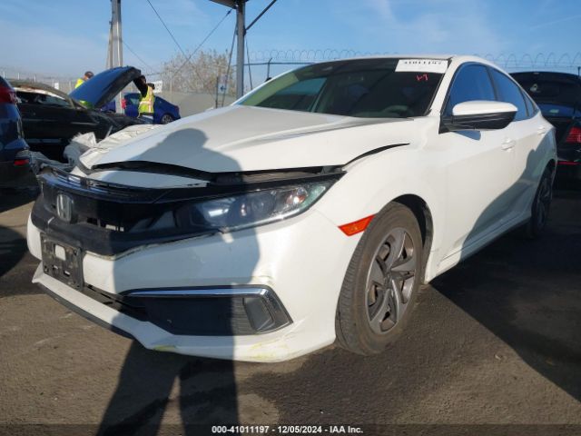 2HGFC2F64LH513021 Honda Civic Lx