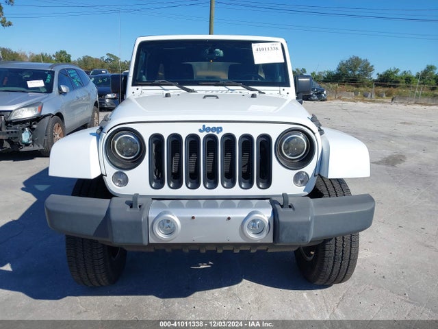 1C4BJWEG4EL213599 Jeep Wrangler Unlimited Sahara