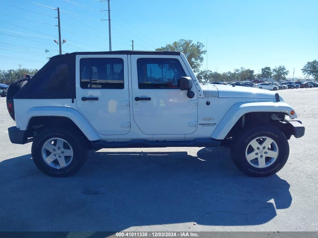 1C4BJWEG4EL213599 Jeep Wrangler Unlimited Sahara