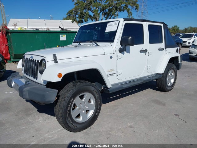 1C4BJWEG4EL213599 Jeep Wrangler Unlimited Sahara