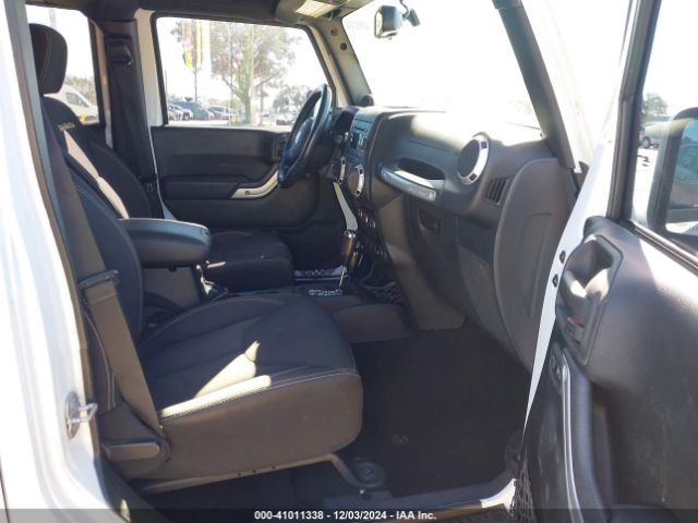 1C4BJWEG4EL213599 Jeep Wrangler Unlimited Sahara
