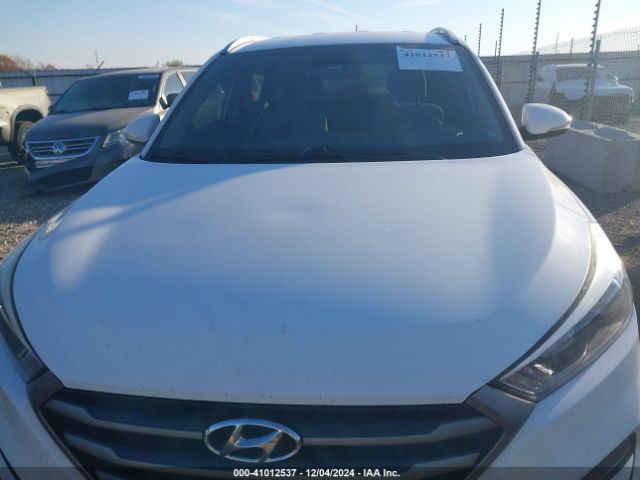 KM8J3CA29GU045613 Hyundai Tucson Eco