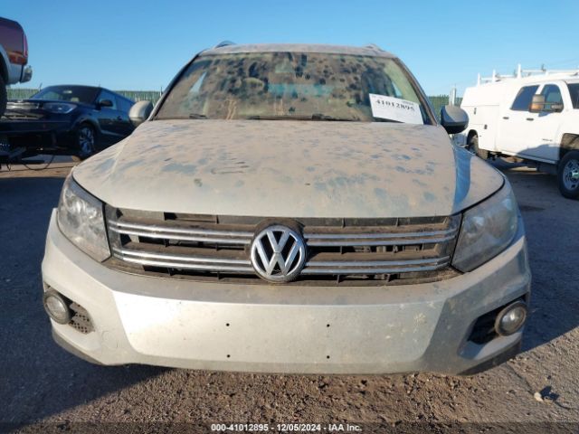 WVGBV3AX5EW532092 Volkswagen TIGUAN SE