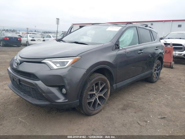 2T3JFREV1GW439242 Toyota RAV4 SE