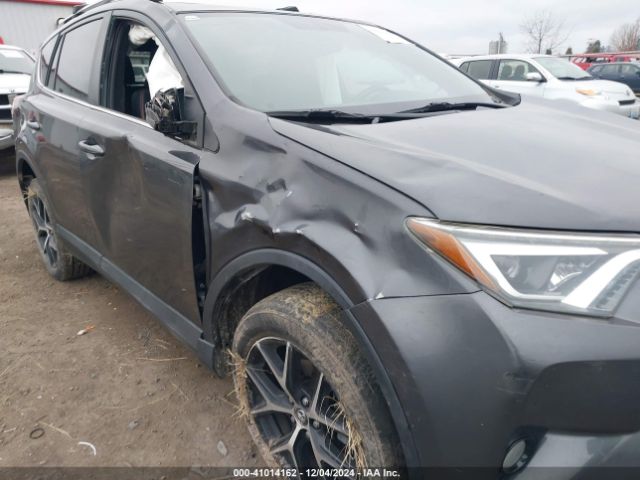 2T3JFREV1GW439242 Toyota RAV4 SE