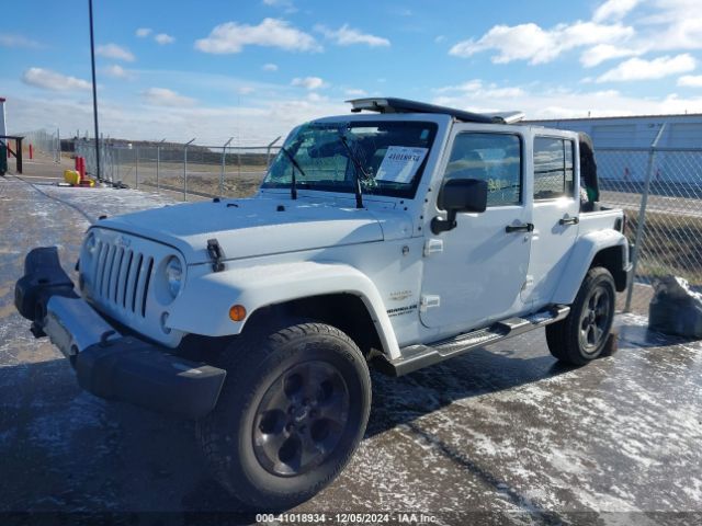 1C4BJWEG0FL771144 Jeep Wrangler Unlimited Sahara